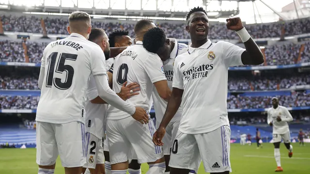 Jogadores do Real Madrid comemoram na vitória sobre o Barcelona