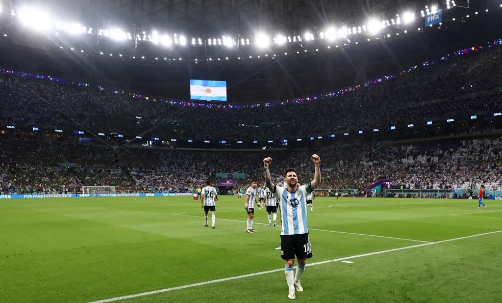 Lionel Messi comemora a vitória da Argentina